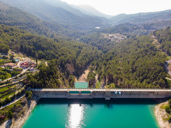 High angle view of swimming pool by mountains