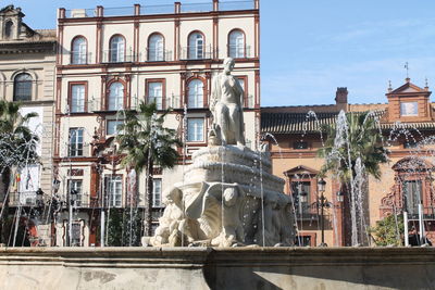 Statue of historic building in city