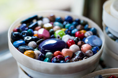 Close-up of multi colored candies in bowl