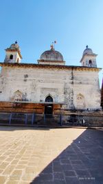 Exterior of historic building against clear sky