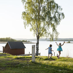 Girls playing at lake