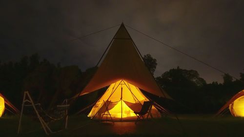 Tent against sky at night