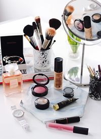 Close-up of make-up products on table