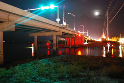 Illuminated street light at night