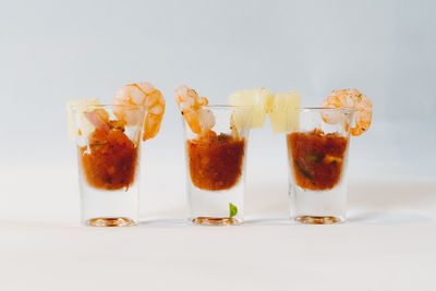 Close-up of fruits against white background