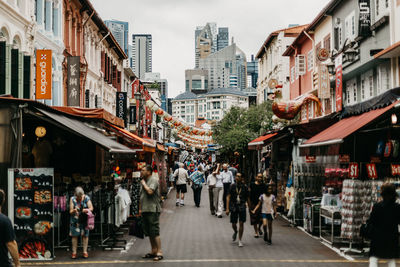 People at market in city