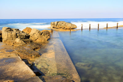 Scenic view of sea against clear sky