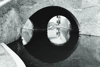 Arch bridge over river