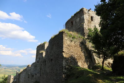 Low angle view of historic building against sky