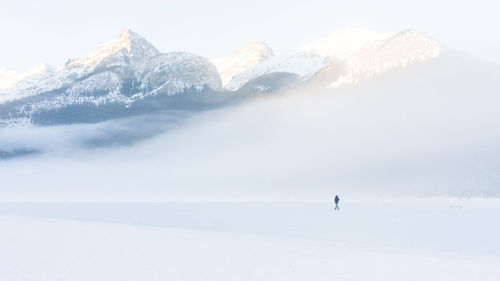 Scenic view of snowcapped mountain against sky