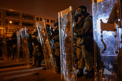 Panoramic shot of workers working at night