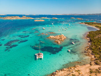 High angle view of sailboat in sea against sky