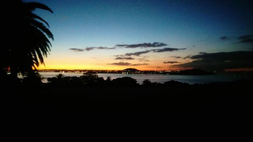 Scenic view of sea against sky at sunset