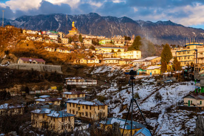 Townscape against sky during winter