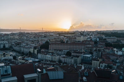 High angle view of townscape against sky during sunset