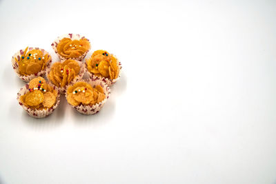 High angle view of cake against white background