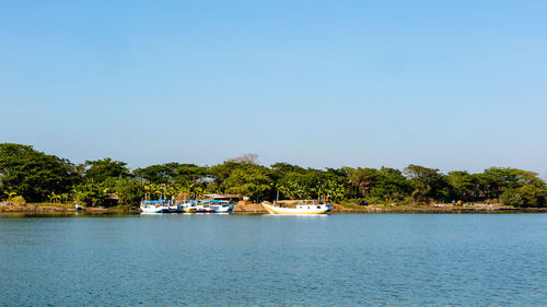 Scenic view of sea against clear sky