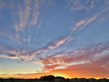 Scenic view of dramatic sky during sunset