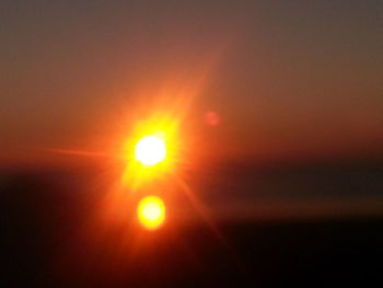 Scenic view of cloudy sky at sunset