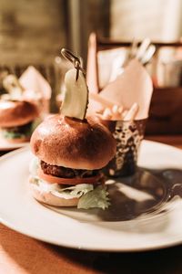 Close-up of burger in plate on table