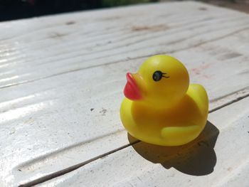 High angle view of yellow toy on table