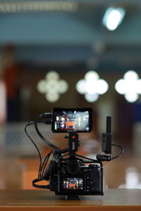 Close-up of camera on table