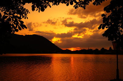 Scenic view of silhouette mountains against sky during sunset