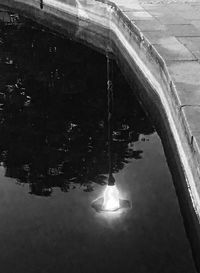 Close-up of illuminated reflection in water