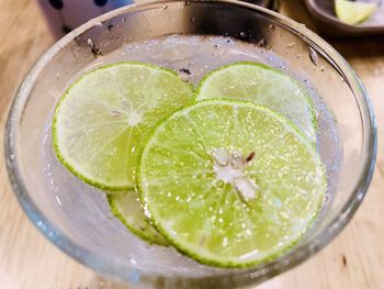 High angle view of lemon in glass on table