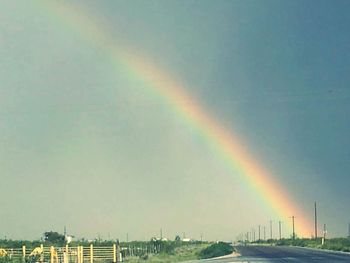 Rainbow over road