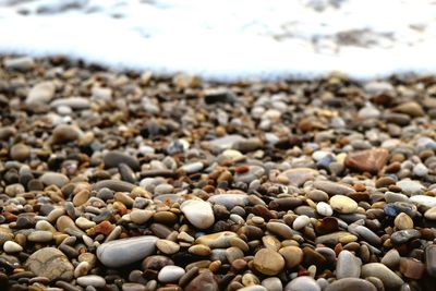 Close-up of pebbles on beach