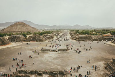 High angle view of tourists at beach