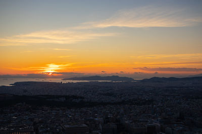 High angle view of townscape against sky during sunset