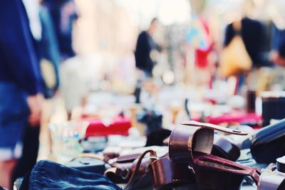 Objects on stall at flea market for sale