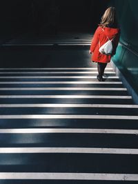Low section of woman on steps