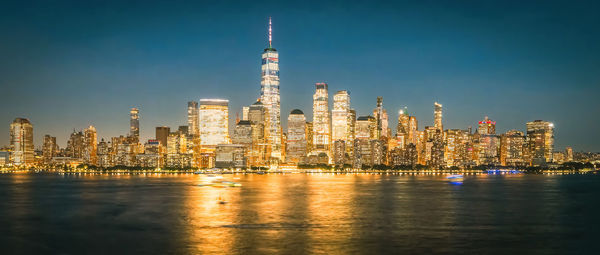 Illuminated buildings in city at night.new york city, united states of america