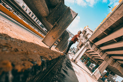 Low angle view of buildings in city against sky