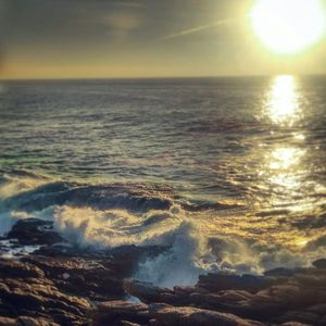 Scenic view of sea against sky during sunset