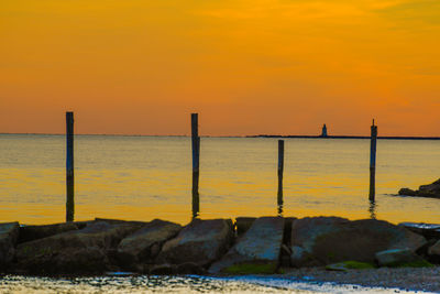 Scenic view of sea at sunset