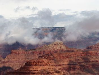 Scenic view of grand canyon against clouds