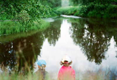 Reflection of trees in pond