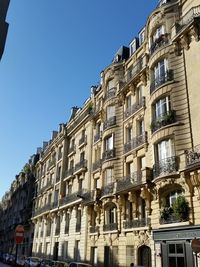 Low angle view of residential building against clear sky