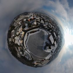 Digital composite image of buildings against sky