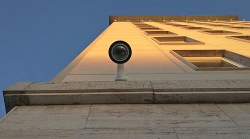 Low angle view of building against blue sky