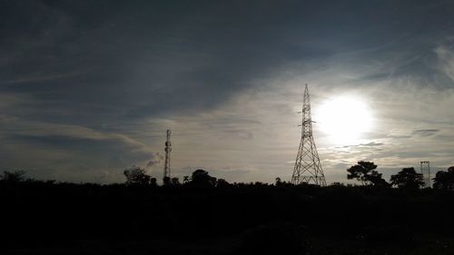 Low angle view of silhouette trees against sky during sunset