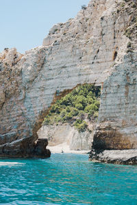 Rock formation with blue ocean in zakynthos, greece.
