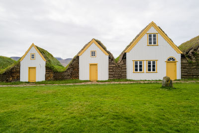 Facades of the glaumbær three turf houses in iceland