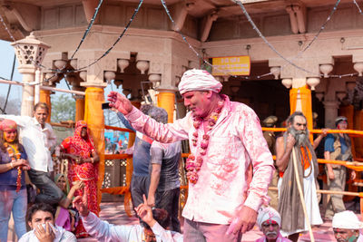 People standing at market stall