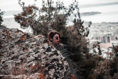 Portrait of man on rock
