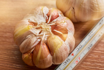 Close-up of garlic on table